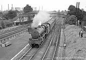 Ex-LMS 5XP 4-6-0 No 45557 'New Brunswick' approaches Water Orton station with a Class B Derby to New Street service