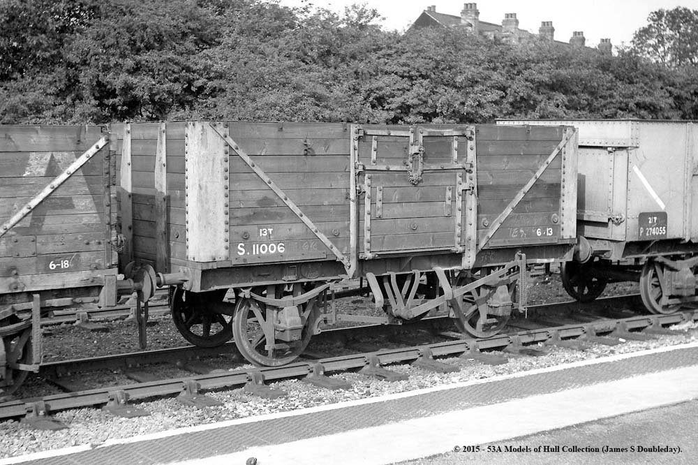 An ex-Southern Railway unfitted 13 ton wooden-bodied eight plank wagon, No S11006, fitted with top and side doors, is seen at Water Orton circa 1959