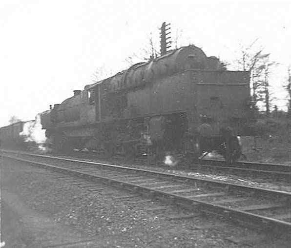 An unidentified ex-LMS Beyer-Garratt 2-6-0+0-6-2 locomotive is seen proceeding on the Kingsbury line to Washwood Heath Sidings