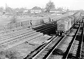 An unidentified British Railways Sulzer Type 4 diesel locomotive is seen coming off the line from Derby with an express service