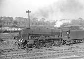 An unidentified British Railways Brush Type 2 diesel locomotive enters the cut off line for Kingsbury line with a freight service