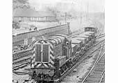 An unidentified British Railways Brush Type 2 diesel locomotive enters the cut off line for Kingsbury line with a freight service