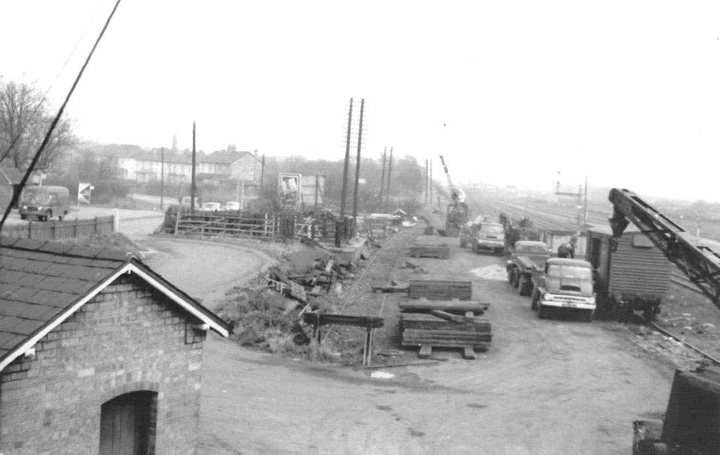 A view of Water Orton's goods yard, the access road from Birmingham Road, and its two sidings in November 1964