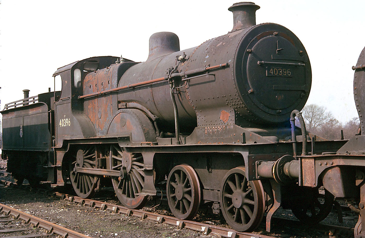 Ex-MR 2P 4-4-0 No 40396 is seen, with others, standing in the stowage sidings opposite Water Orton's goods yard in March 1962