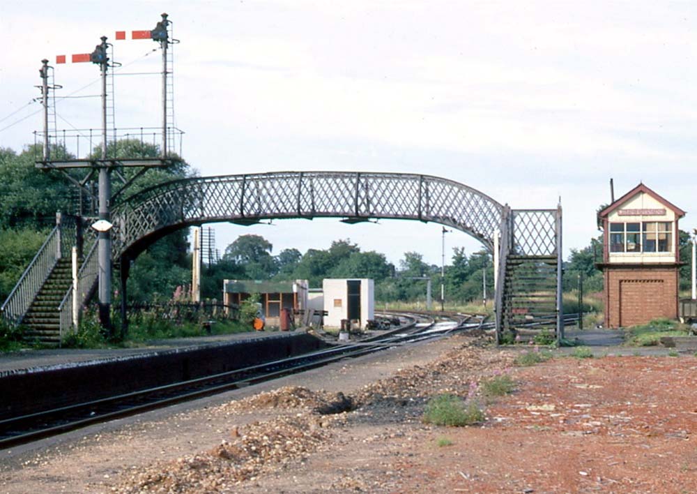 View looking towards Kingsbury with the line to Nuneaton curving away to the right behind the signal box on 3rd August 1969