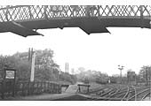 Ex-MR 3F 0-6-0 No 43246 is seen shunting open wagons in Whitacre Station's goods yard circa 1949