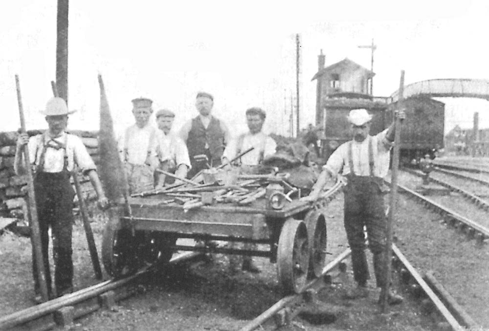 A plate layer's small hand truck or 'lurry' is seen standing on one of the sidings at the north east end of Whitacre Station