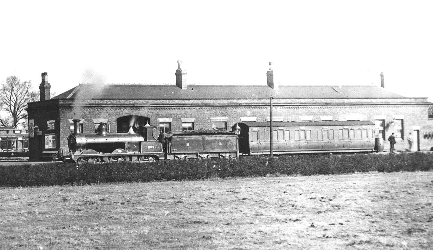 Close up of MR 0-6-0 No 2641 at the head of a single coach train to Hampton