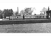 Close up showing the rear two carriages of an express train to either Tamworth or to Leicester via Nuneaton