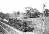 Ex-LMS 4P 4-4-0 No 40907 approaches Whitacre with an Ordinary passenger service on 1st September 1952