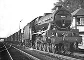 Ex-LMS 5XP 4-6-0 No 45597 'Barbados' is seen passing Perrin and Harrison's Sidings signal box on 20th May 1963