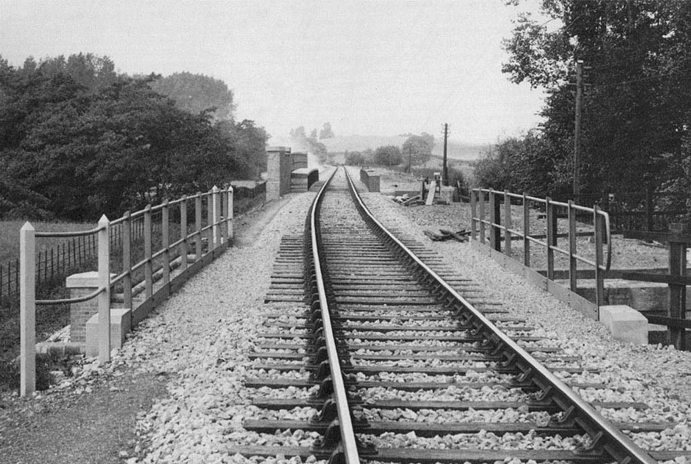View of the single line track looking towards Alcester showing the new bridge, No 5, which replaced Bridge No 51, No 52 and No 53