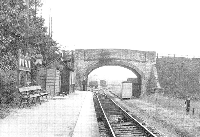 Looking to Broom along the platform beyond the bridge to the sidings in the yard