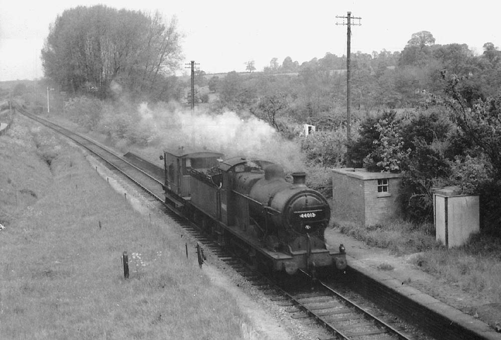 Ex-MR  0-6-0 4F No 44013 with a MR Deeley tender is seen heading for Broom with just a brake van in tow on 11th May 1959