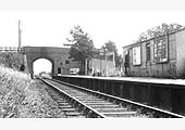 A later view looking towards Stratford upon Avon through the road bridge and showing the huts used by the coal merchants