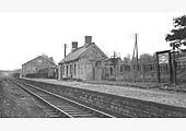 Looking towards Broom with the station building on the right, the goods shed and in the distance the single siding with open wagons