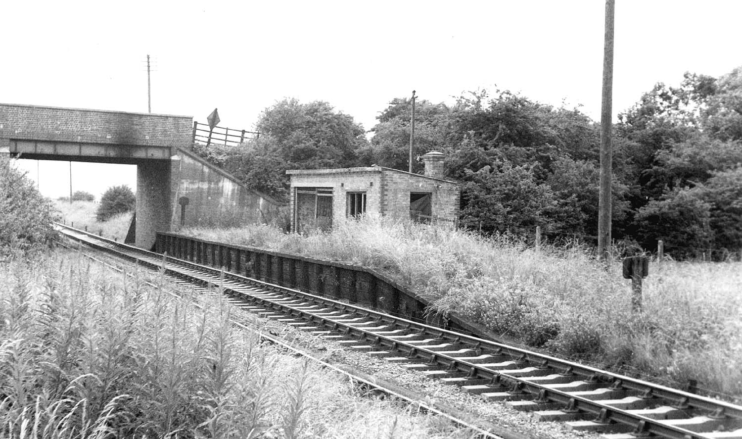 Looking East towards Stratford upon Avon showing Burton Bassett Platform's building now abandoned