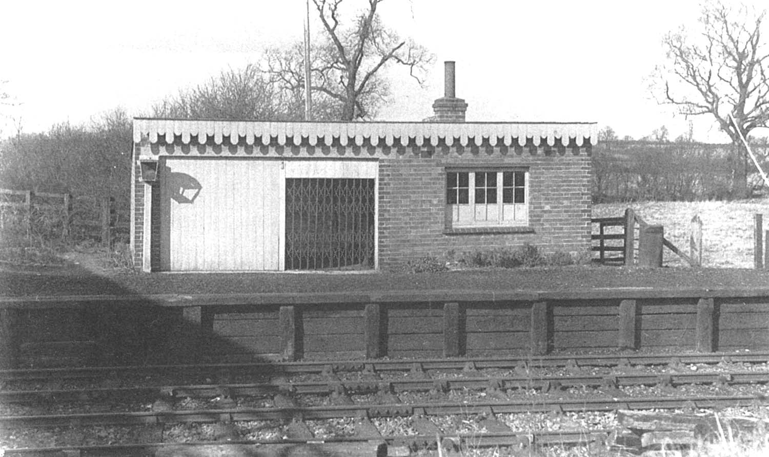 A side on view of Burton Dassett Platform showing the storage facilities on the left and the office on the right