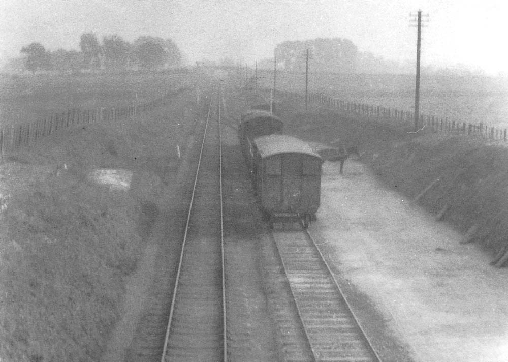 Looking towards Fenny Compton from the road bridge with the single line section starting at the end of the siding