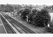 Close up showing Ettington station's down platform and its waiting room plus the platform sited signal box