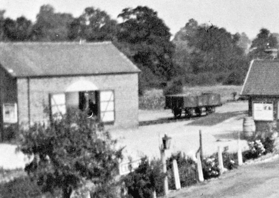 Close up showing the goods shed's side elevation  facing the railway and the entrance used by road vehicles