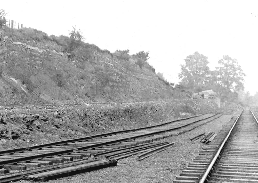 Close up showing the limestone quarry's exchange facilities and the undulating unballasted trackwork of the siding