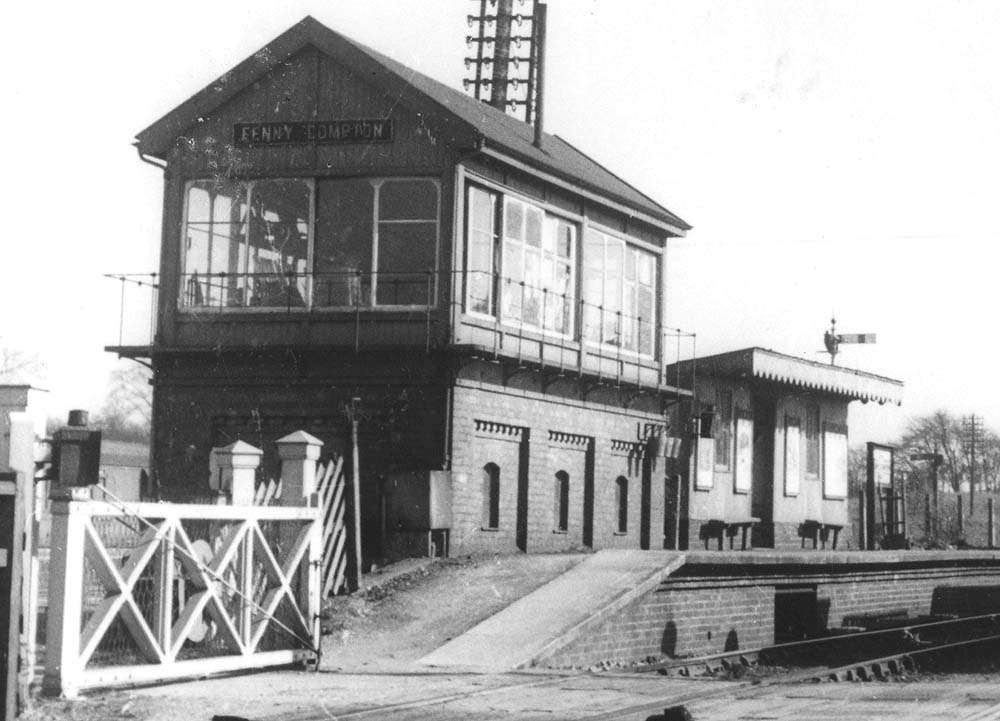 Close up showing the joint signal box and Fenny Compton SMJ station's up platform waiting room and store