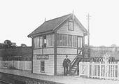 A signalman at Fenny Compton's original signal box, supplied by the Railway Signal Company, poses for the camera
