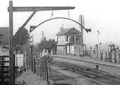 Close up showing the joint signal box framed by the loading gauge sited at the entrance to the goods yard