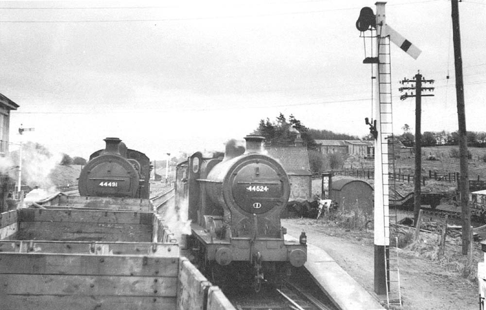 A pair of ex-LMS 4F 0-6-0s Nos 44491 and 44524 are seen passing each other at Fenny Compton station