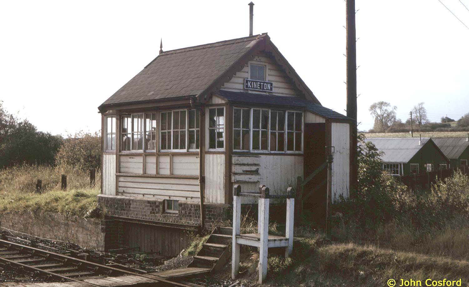 A colour view of Kineton station with the signalman's platform to exchange the token on the right