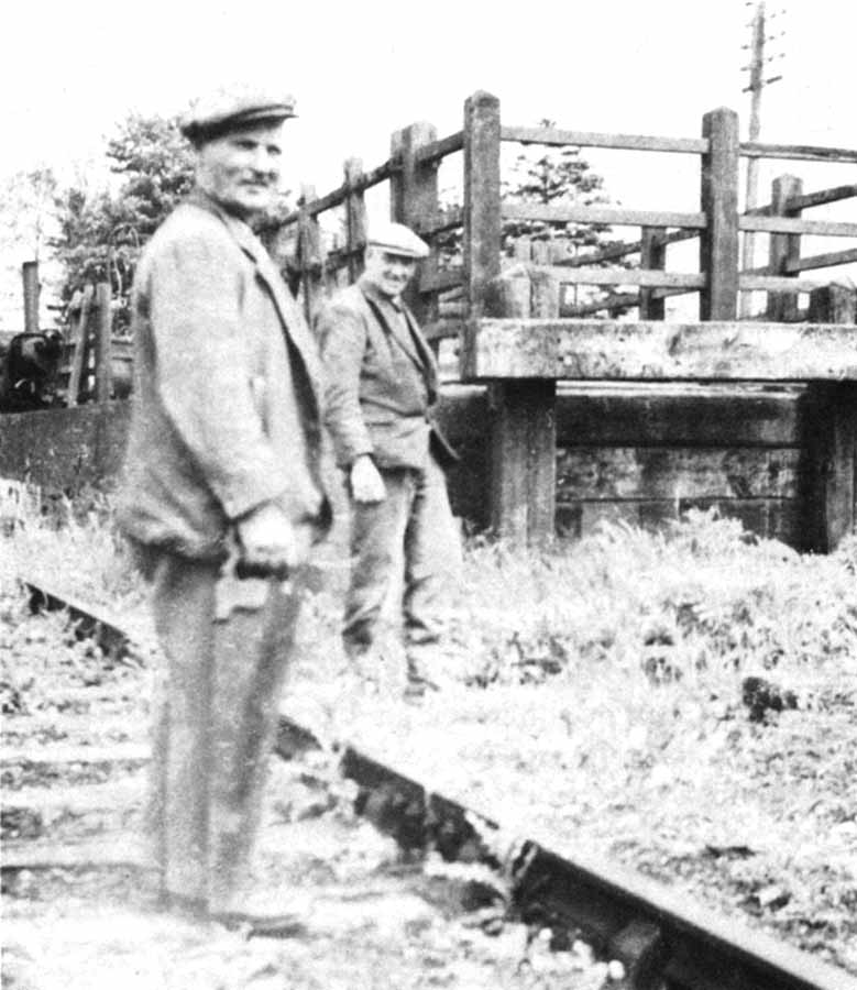  PW Ganger A Campion and platelayer J Mills stand alongside the cattle dock at Kineton station