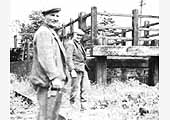  PW Ganger A Campion and platelayer J Mills stand alongside the cattle dock at Kineton station