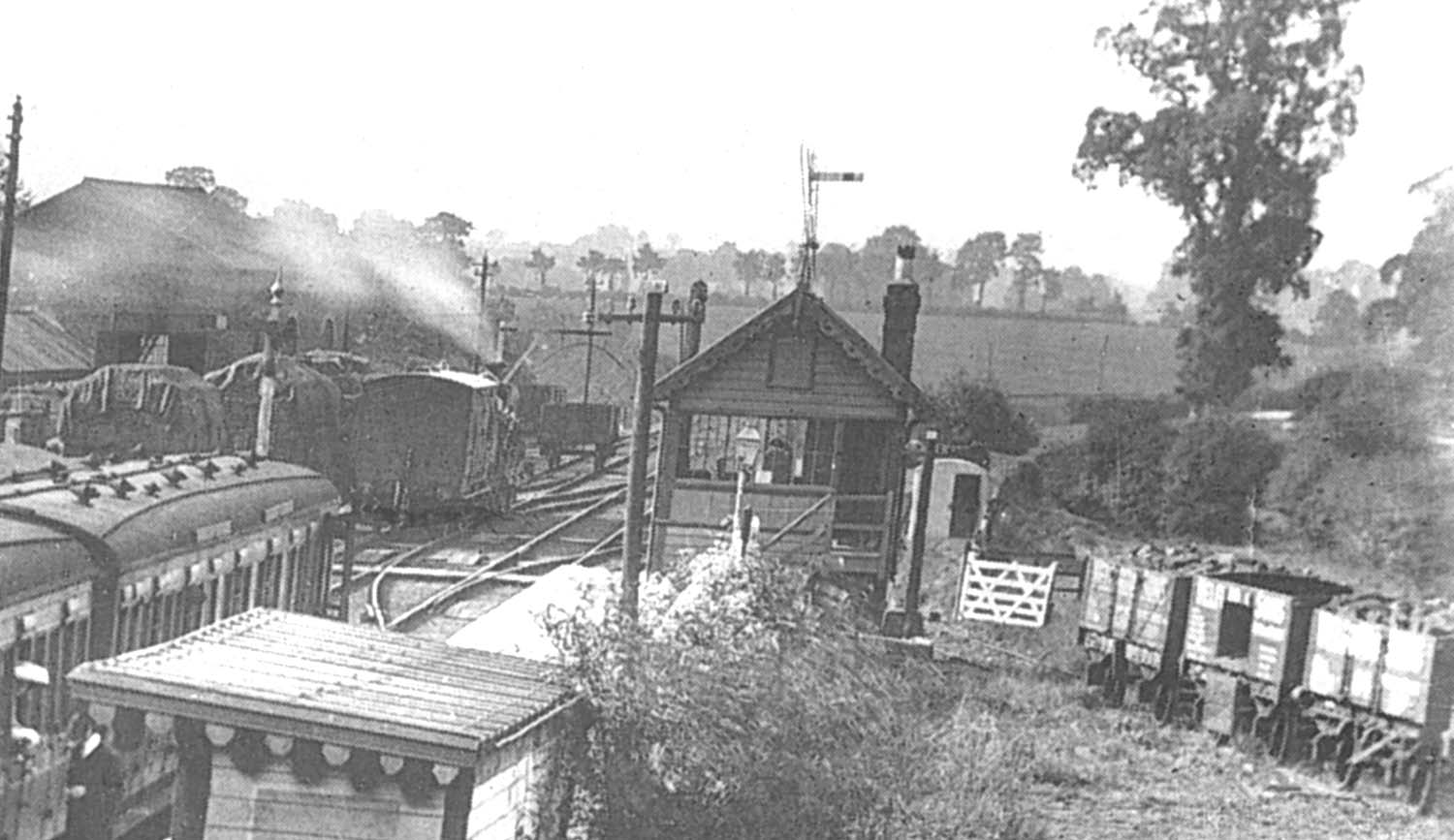 Close up showing what appears to be an SMJ tank engine in the process of shunting a horse box