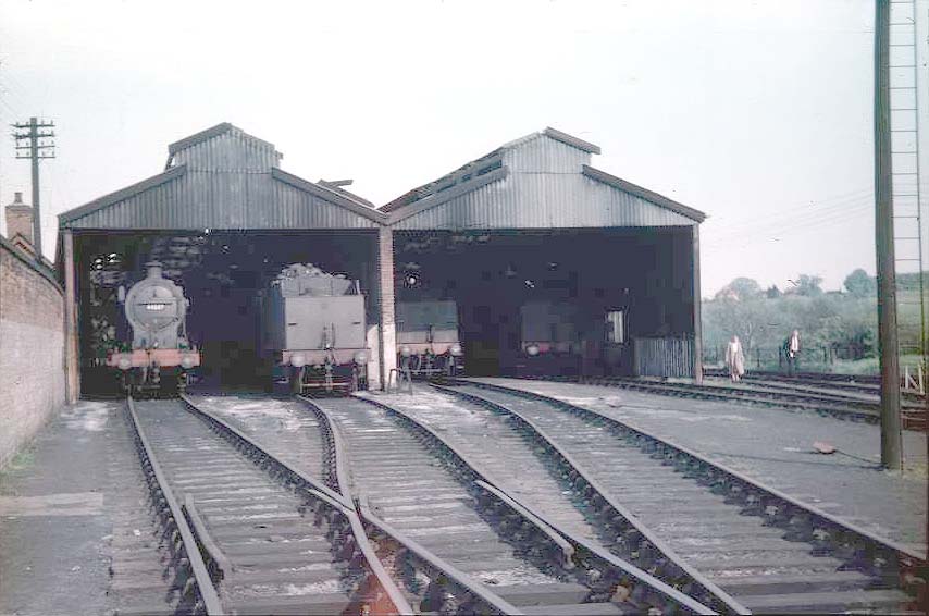 Ex-LMS 0-6-0 4F No 44587 is seen standing inside Stratford on Avon shed in company with other classmates on 21st May 1956