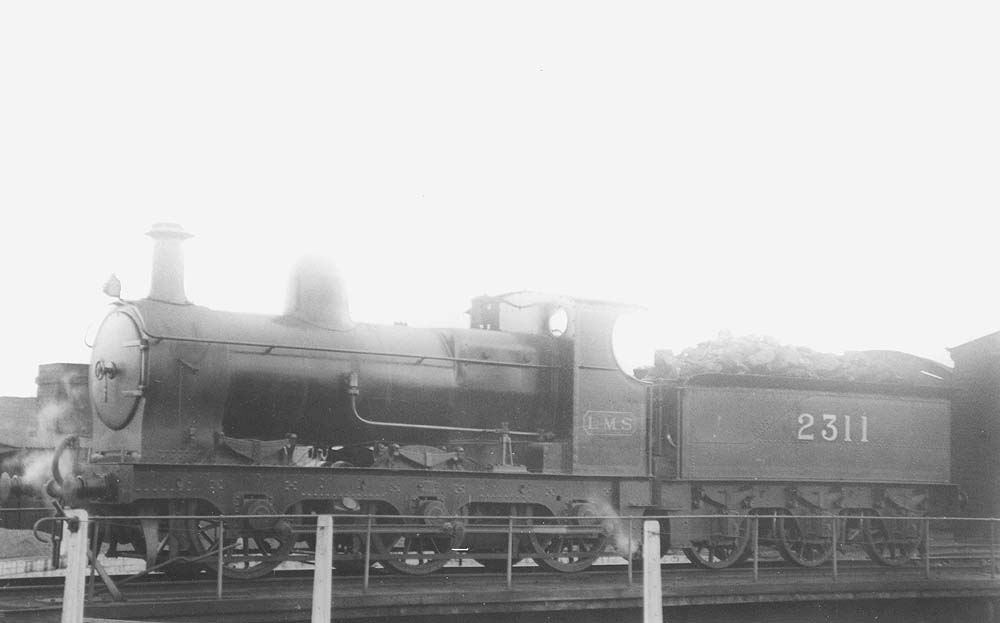 Ex-SMJ 0-6-0 No 2311 formerly SMJ No 18 is seen standing on the repositioned turntable on 8th April 1924