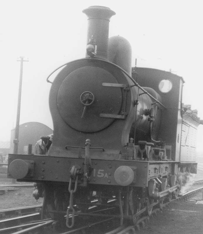 View of the front of SMJ 0-6-0 No 15 as it stands on one of the roads outside the shed on 11th April 1924