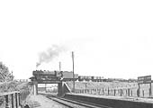 Ex-WD 2-8-0 No 90312 is seen crossing over the former GWR line as it proceeds to Broom on a engineer's train on 28th May 1960