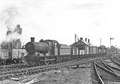Ex-LMS 4F 0-6-0 No 44188 stands at the head of a SLS Special at Stratford Old Town station on 24th April 1965