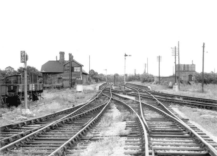 View on 18th August 1962 of the derelict station looking East and showing the second signal box has now been replaced by a ground frame