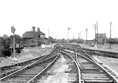 View of the derelict station looking East and showing the signal box has now been replaced by a ground frame