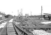 View of the demolished shed showing only the water tower tower, coal stage and water column remaining