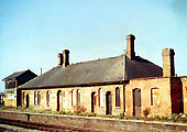View on 12th October 1963 of the derelict original signal box and station after the removal of its second canopy