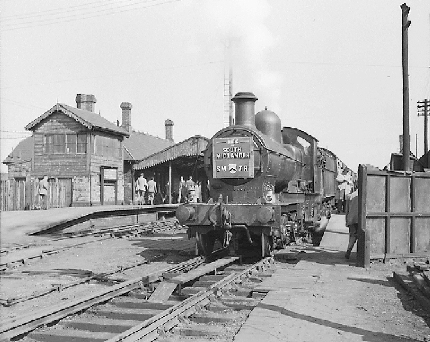 Ex-GWR 4-4-0 'Dukedog' class No 9015 is seen standing at Stratford on Avon at the head of the South Midlander SMJ Rail Tour