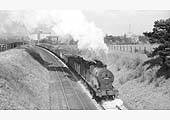 Ex-MR 4F 0-6-0 No 43853 leaves Stratford Old Town with a Class 6 service bound for Blisworth in the early 1960s