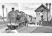 Ex-LMS 4F 0-6-0 No 44121 slows down to hand in the staff for the section from Broom to Stratford Old Town on 19th June 1954
