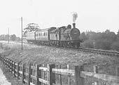 Ex-MR 3F 0-6-0 No 3884 proceeds towards Ettington with a two-coach local service on 15th May 1942