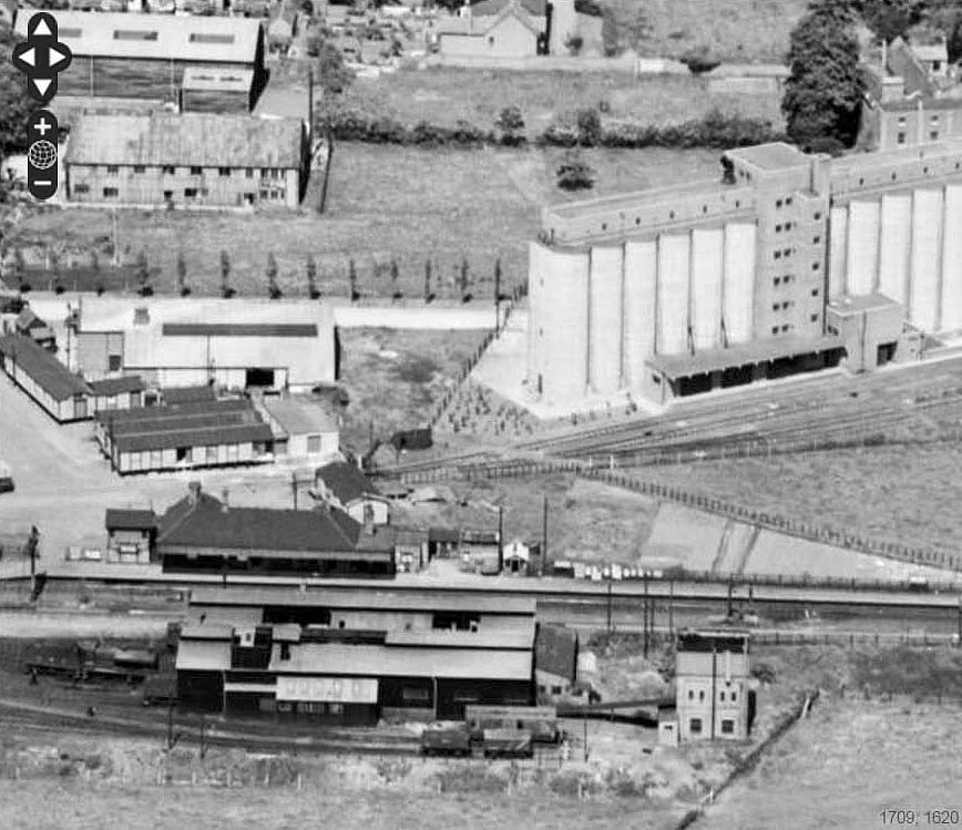 Close up showing the eastern end of the station and shed with the WD Store and water tank prominent on 23rd June 1952