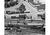 Close up showing an ex-MR 3F 0-6-0 locomotive and an LMS 4F 0-6-0 locomotive outside the shed on 23rd June 1952