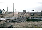 Looking across the long defunct turntable towards the now demolished engine shed with the coaling stage on the right